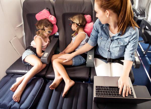 by the sea with three plane pal best travel accessories flying with kids