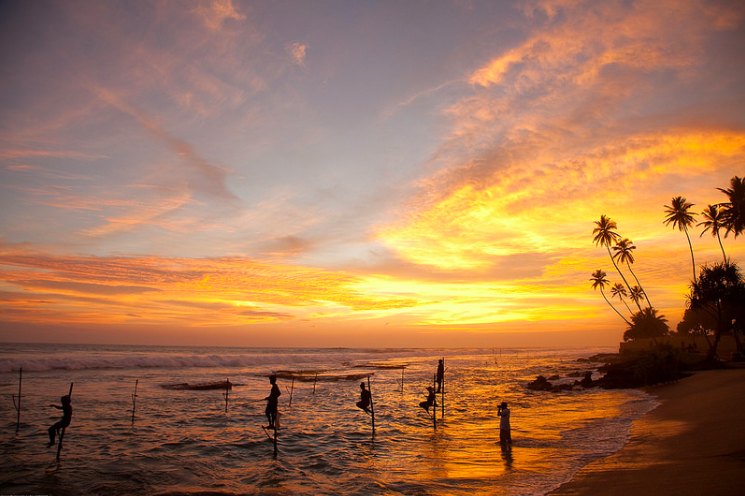 sri lanka fishing off beach sunset the family travel hub